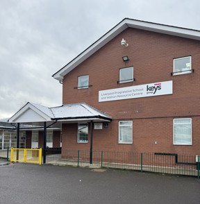 Red-brick exterior of Liverpool Progressive School and Walton Resource Centre with Keys Group signage