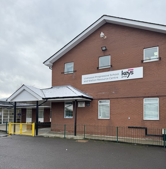 Red-brick exterior of Liverpool Progressive School and Walton Resource Centre with Keys Group signage