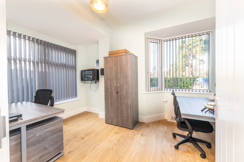 Office at Church Road with desks, office chairs and a storage cupboard